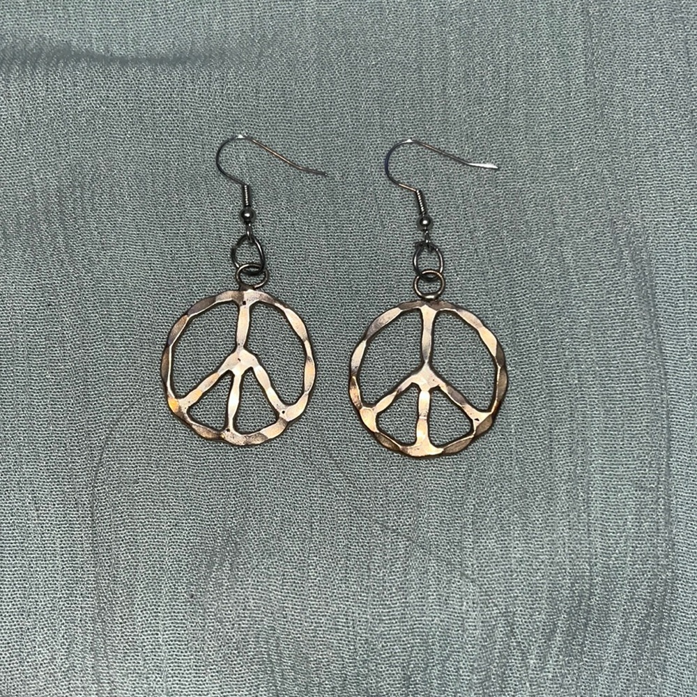 iron earrings in perfect condition. peace sign.